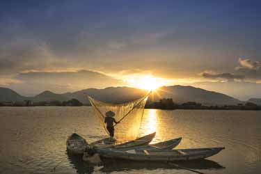 Fisherman at Dusk, Vietnam Tours