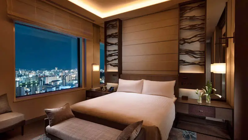 Guest room at Hilton Hiroshima, conveniently located in central Hiroshima with city views