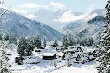 Snow-covered village of Shirakawa-go with traditional gassho-zukuri houses in winter