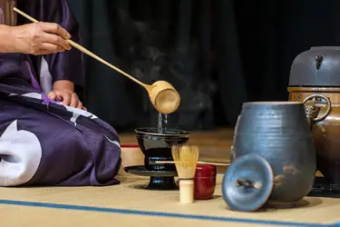 Japanese tea ceremony showcasing traditional utensils and ceremonial preparation