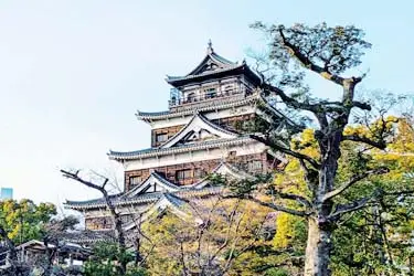Hiroshima Castle surrounded by trees in central Hiroshima, Japan