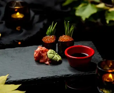 In Osaka's culinary tradition, ikura and precision plating transform ingredients into art—where gastronomic mastery elevates the ordinary