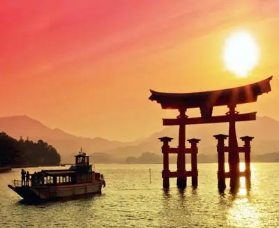 Golden sunset over Miyajima’s floating torii gate and tranquil waters