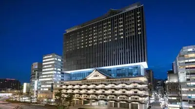 Royal Osaka Classic Hotel rises amid the city's urban landscape—contemporary accommodation where modern comfort anchors cultural exploration.