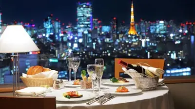 Rooftop fine dining with Tokyo skyline and Tokyo Tower view at luxury Cerulean Tower hotel in Shibuya