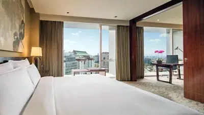 Refined guest room at Regent Beijing, a luxury hotel near Wangfujing shopping and major city landmarks