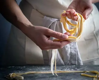 Hand-pulled noodle workshop in Xi’an showcasing traditional noodle-making techniques