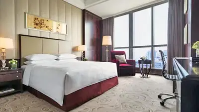 Guest room at JW Marriott Chongqing, a luxury hotel offering modern comfort and convenient access to the city center.
