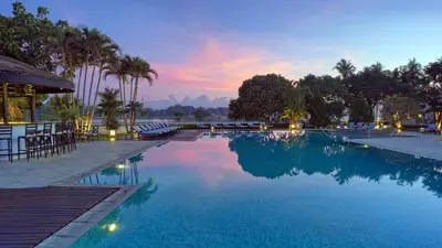 Riverside infinity pool at Azerai La Residence Hue, Vietnam, offering elegant colonial charm and serene views for a refined luxury stay near the Perfume River.