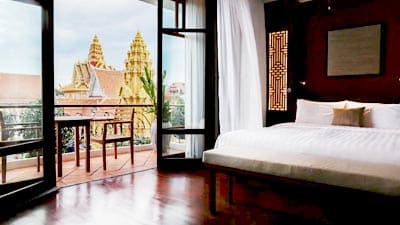 Phnom Penh Amanjaya Pancam Suites with a view of the Royal temple.
