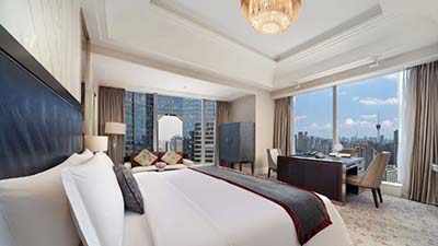 Guest room at The St. Regis Chengdu, a luxury hotel offering elegant accommodations and central city access.