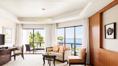 Ocean-view suite at Shangri-La Tanjung Aru in Kota Kinabalu, Malaysia, featuring a private balcony overlooking the South China Sea and tropical palms