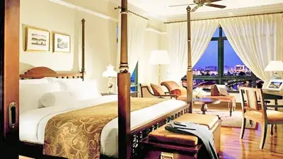 Luxurious boutique accommodation at The Majestic Malacca showcasing classic colonial design and tranquil riverside scenery