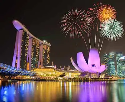 Fireworks over Marina bay in Singapore on national day fireworks celebration