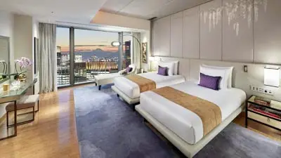Refined guest room interior at Mandarin Oriental Tokyo with floor-to-ceiling windows
