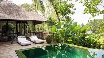 Private pool villa at Komaneka at Bisma in Ubud, Bali, featuring tranquil jungle views and elegant Balinese design for a serene luxury retreat.