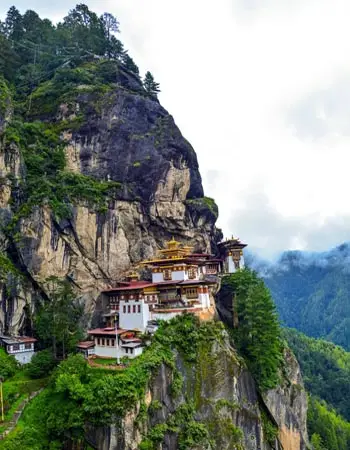 Tiger’s Nest Monastery (Paro Taktsang) clinging to a sheer cliff above the Paro Valley, Bhutan