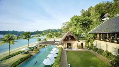 Gaya Island Resort in Sabah, Malaysia, featuring hillside villas, infinity pool, and private beach overlooking the South China Sea