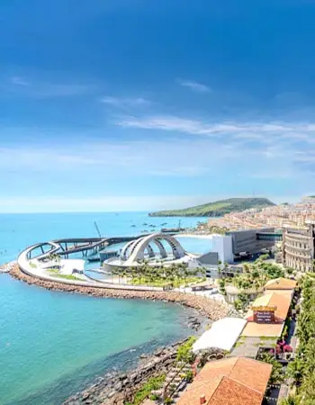 Aerial view of modern waterfront architecture along the coast of Phu Quoc, Vietnam, showcasing the island’s blend of contemporary development and turquoise seaside beauty.