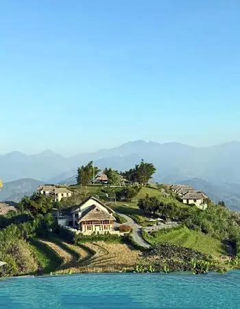 Mountain retreat overlooking terraced hills in Sapa, Vietnam, showcasing the region’s breathtaking highland scenery and peaceful rural charm.