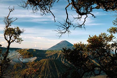 Panoramic view of volcanic peaks and valleys at Mount Bromo in East Java, Indonesia.