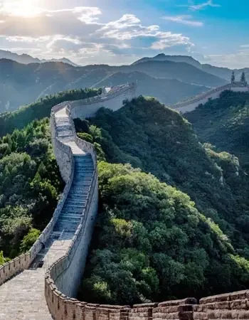 Chin_375-250_Great_Wall Stone walkway of the Great Wall stretching over mountainous terrain in China