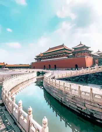 China_350-450_Forbidden_City Historic moat and red palace walls of the Forbidden City in Beijing, China, with traditional imperial architecture inside the UNESCO World Heritage palace complex.